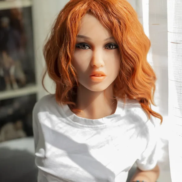 Elegant Slim Redhead Doll Ava with Blue Eyes – Sitting View